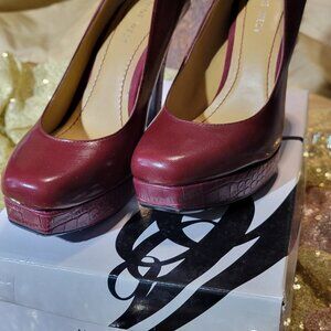 Women's Nine West marron 5-inch heel pumps in size 6.5